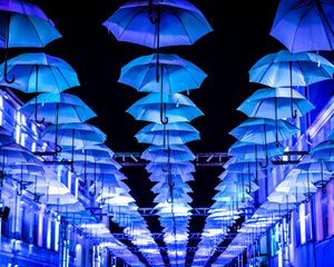 Preview wallpaper umbrellas, scenery, street, illumination, lights