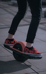 Preview wallpaper unicycle, legs, sneakers, road