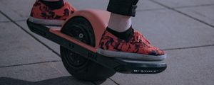 Preview wallpaper unicycle, legs, sneakers, road