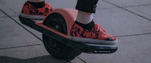 Preview wallpaper unicycle, legs, sneakers, road