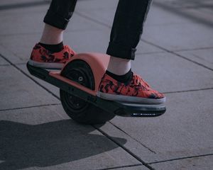 Preview wallpaper unicycle, legs, sneakers, road