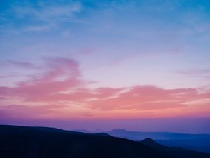 Preview wallpaper valley, clouds, sunset, distance, sky