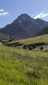 Preview wallpaper valley, grass, mountains, landscape, nature