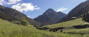 Preview wallpaper valley, grass, mountains, landscape, nature