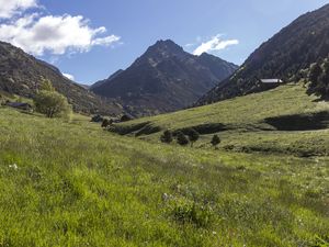 Preview wallpaper valley, grass, mountains, landscape, nature