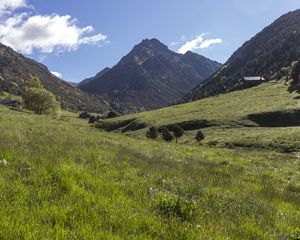 Preview wallpaper valley, grass, mountains, landscape, nature