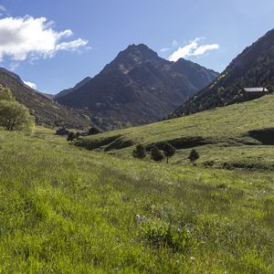 Preview wallpaper valley, grass, mountains, landscape, nature