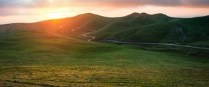 Preview wallpaper valley, grass, sunset, path