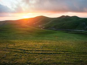 Preview wallpaper valley, grass, sunset, path