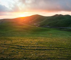 Preview wallpaper valley, grass, sunset, path