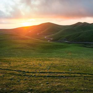 Preview wallpaper valley, grass, sunset, path