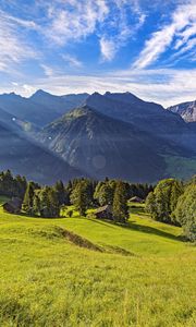 Preview wallpaper valley, grass, trees, mountains, sunlight, landscape