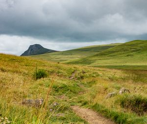 Preview wallpaper valley, hills, path, grass, flowers, nature