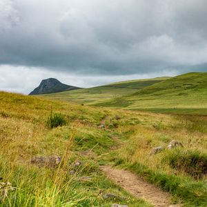 Preview wallpaper valley, hills, path, grass, flowers, nature