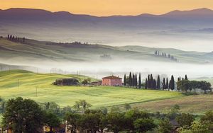 Preview wallpaper valley, home, fog, slopes, plain, trees, mountains