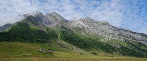 Preview wallpaper valley, house, mountains, grass, landscape