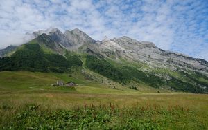 Preview wallpaper valley, house, mountains, grass, landscape