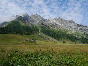 Preview wallpaper valley, house, mountains, grass, landscape