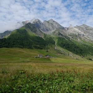 Preview wallpaper valley, house, mountains, grass, landscape