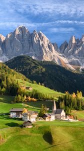 Preview wallpaper valley, houses, grass, mountains, landscape