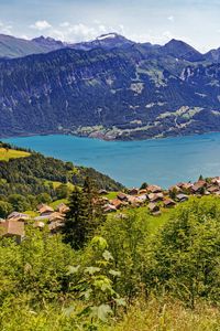 Preview wallpaper valley, lake, landscape, mountains, houses