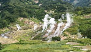 Preview wallpaper valley, mountains, grass, smoke, nature