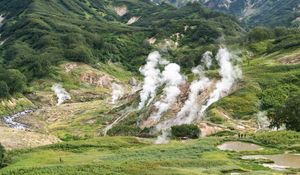 Preview wallpaper valley, mountains, grass, smoke, nature