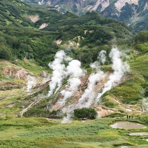 Preview wallpaper valley, mountains, grass, smoke, nature