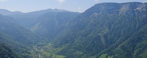 Preview wallpaper valley, mountains, houses, landscape, trees