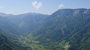 Preview wallpaper valley, mountains, houses, landscape, trees