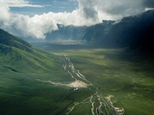 Preview wallpaper valley, road, aerial view, hills, clouds, landscape