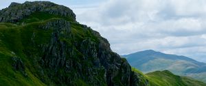 Preview wallpaper valley, rocks, mountains, distance, grass