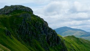 Preview wallpaper valley, rocks, mountains, distance, grass