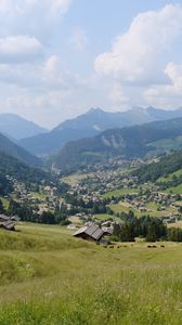 Preview wallpaper valley, slope, nature, houses, mountains