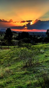 Preview wallpaper valley, sunset, grass, sky