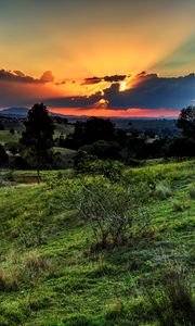 Preview wallpaper valley, sunset, grass, sky