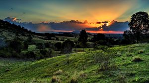 Preview wallpaper valley, sunset, grass, sky