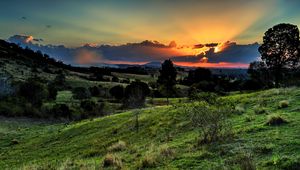 Preview wallpaper valley, sunset, grass, sky