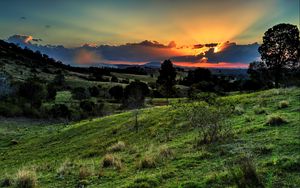 Preview wallpaper valley, sunset, grass, sky