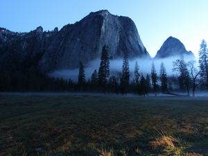 Preview wallpaper valley, trees, fog, mountain