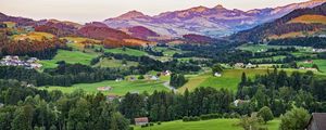 Preview wallpaper valley, trees, grass, houses, mountains