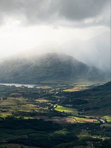 Preview wallpaper valley, trees, houses, mountains, fog