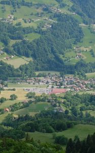 Preview wallpaper valley, trees, houses, aerial view