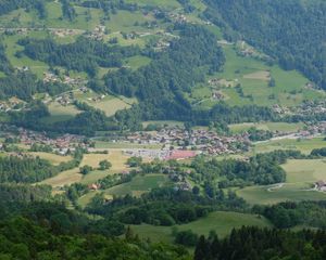Preview wallpaper valley, trees, houses, aerial view