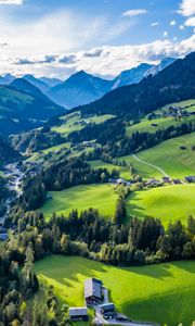 Preview wallpaper valley, trees, mountains, village, distance