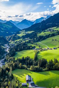 Preview wallpaper valley, trees, mountains, village, distance