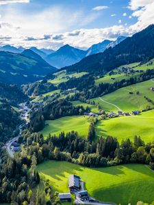 Preview wallpaper valley, trees, mountains, village, distance