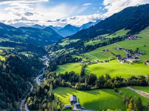 Preview wallpaper valley, trees, mountains, village, distance