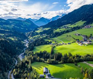 Preview wallpaper valley, trees, mountains, village, distance