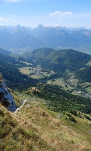 Preview wallpaper valley, trees, mountains, slope, grass